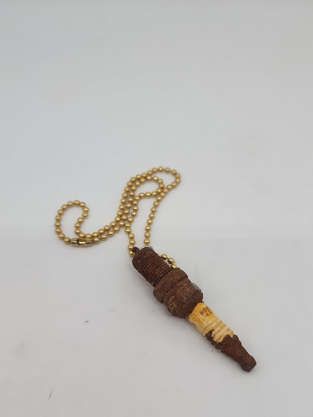 GASOLINE GLAMOUR RUSTY SPARKPLUG NECKLACE